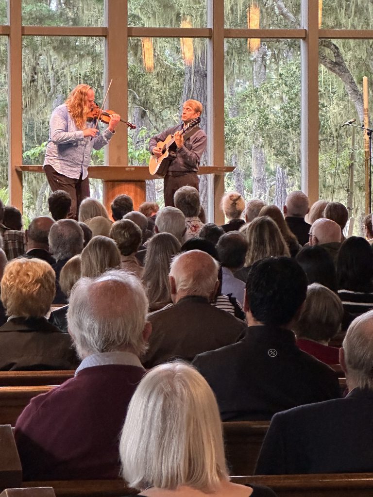 men playing music for an audience